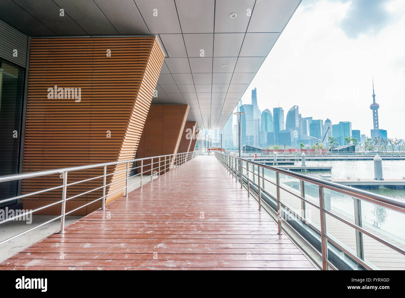 empty wooden road around buildings Stock Photo - Alamy