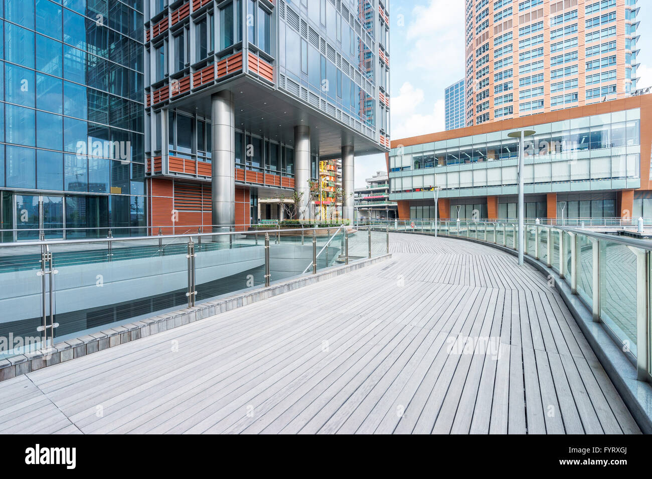 empty wooden road around buildings Stock Photo - Alamy