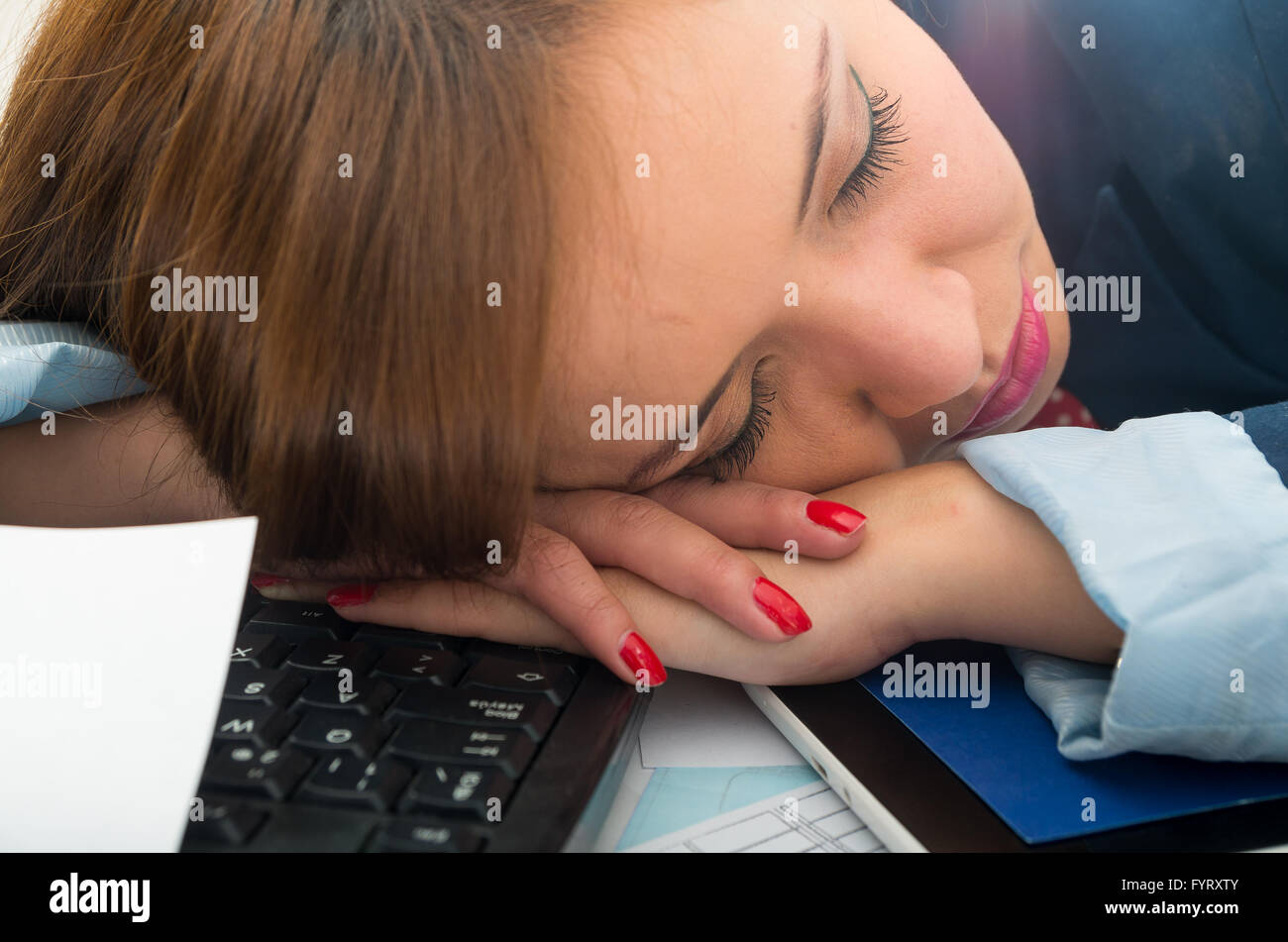 Office Woman Bent Over White Desk Resting Or Sleeping With