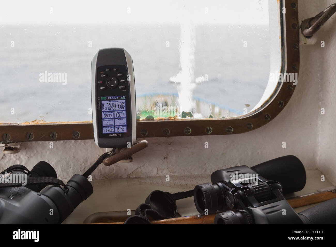 Garmin GPS coordinates on the screen 75 02.634 N and  75 02.645 E in Kara sea Stock Photo