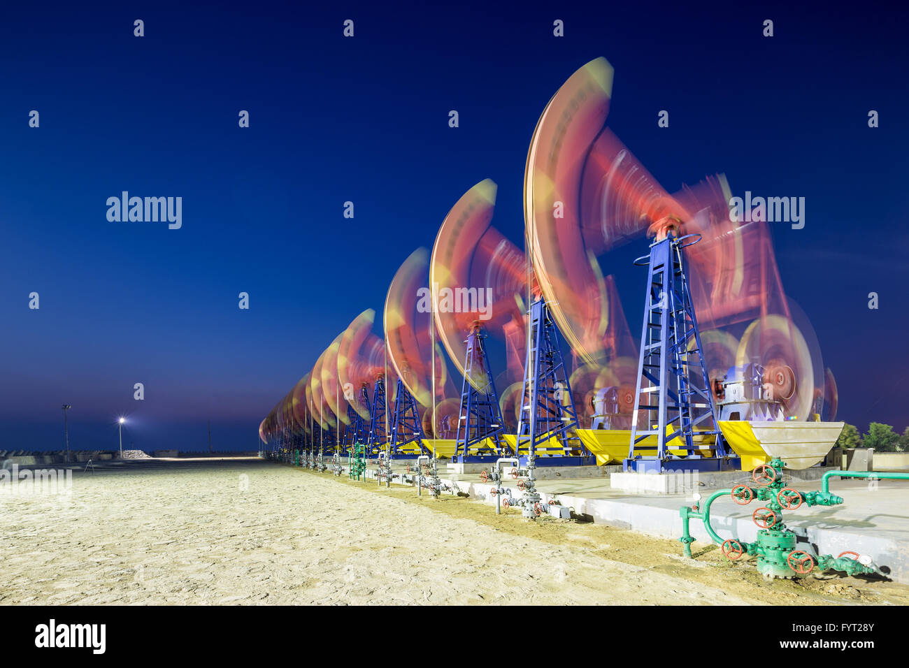 oil-rig of oilfield day and night Stock Photo