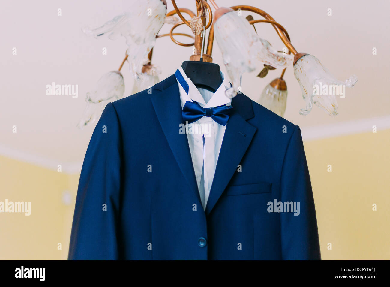 Hanging groom suit hi-res stock photography and images - Alamy