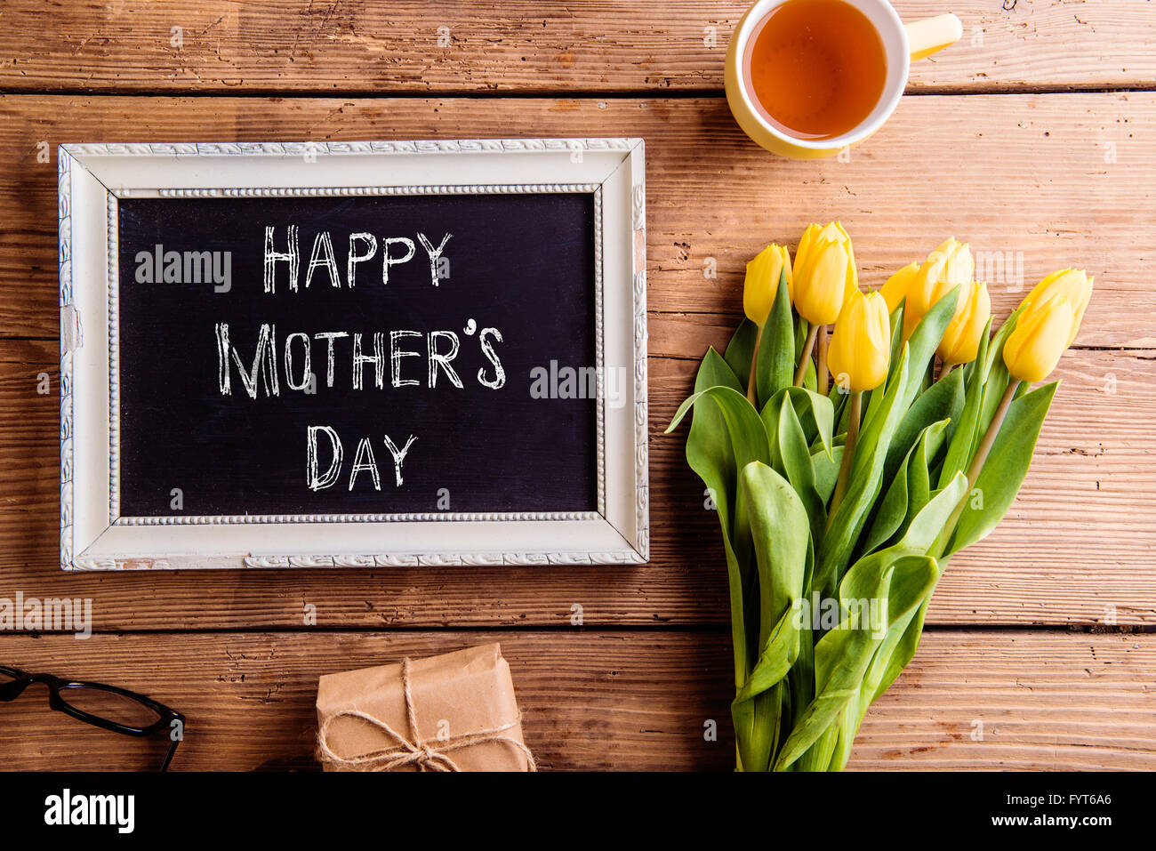 mothers day composition picture frame with chalk sign stock photo