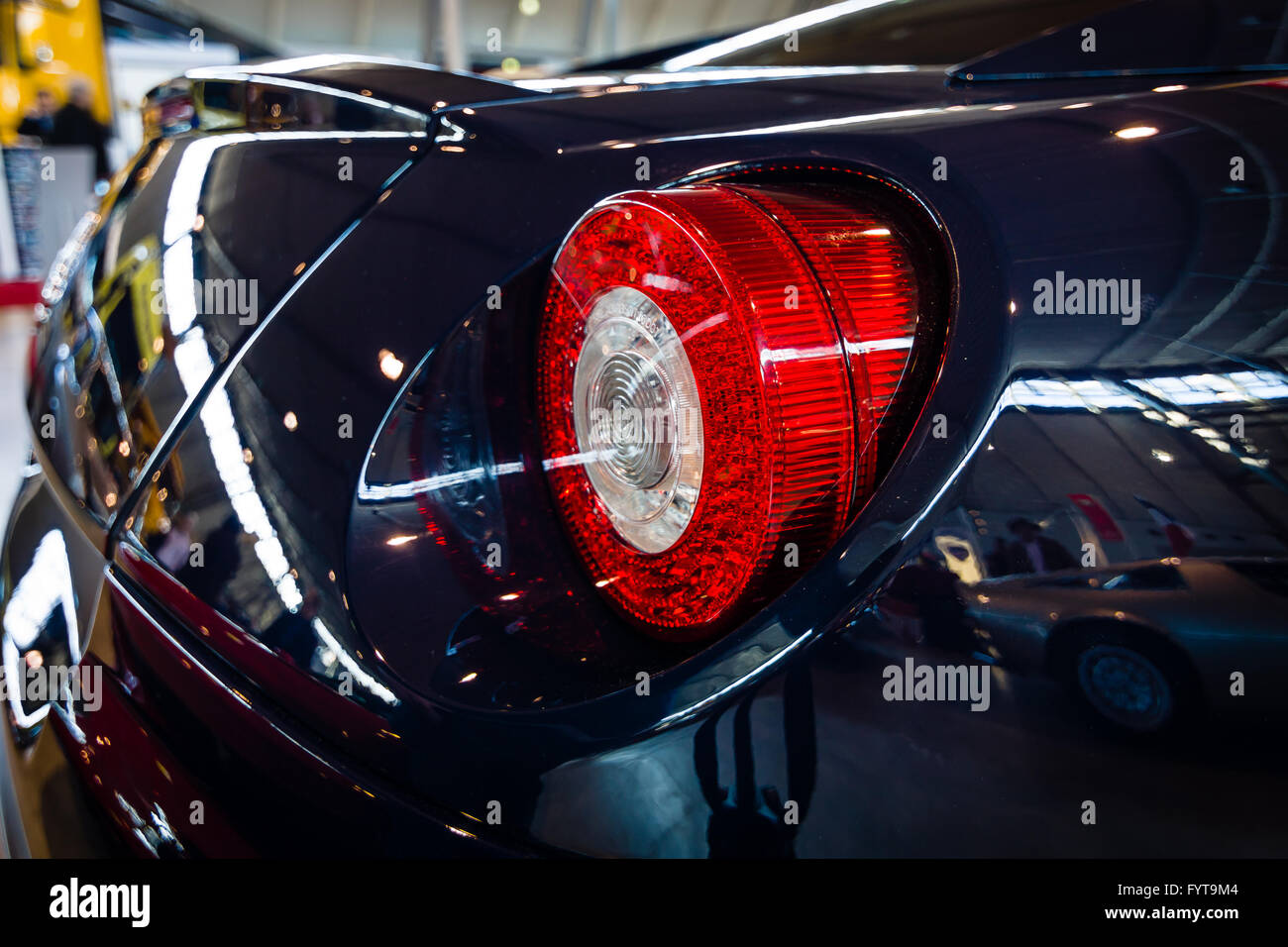 The rear brake lights of sports car Ferrari 599 GTB Fiorano F1, 2008. Stock Photo