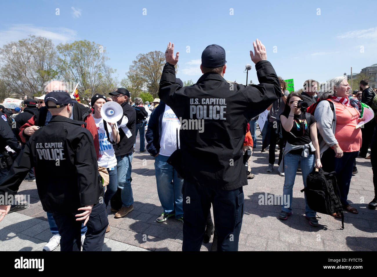 US Capitol Police holding line protesters during public demonstration - Washington, DC USA Stock Photo