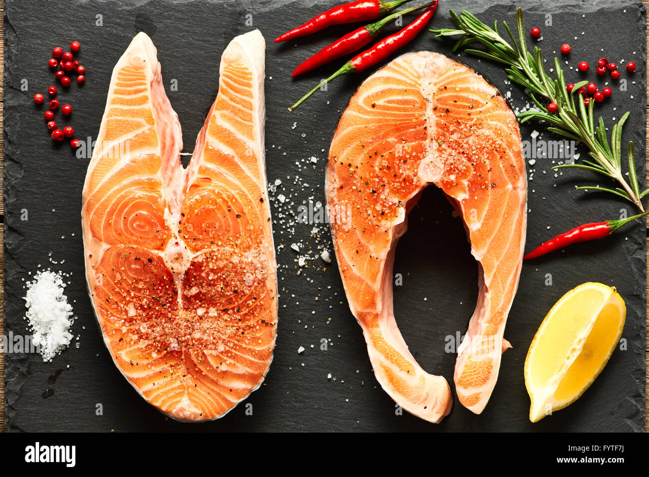 Raw salmon steaks Stock Photo - Alamy