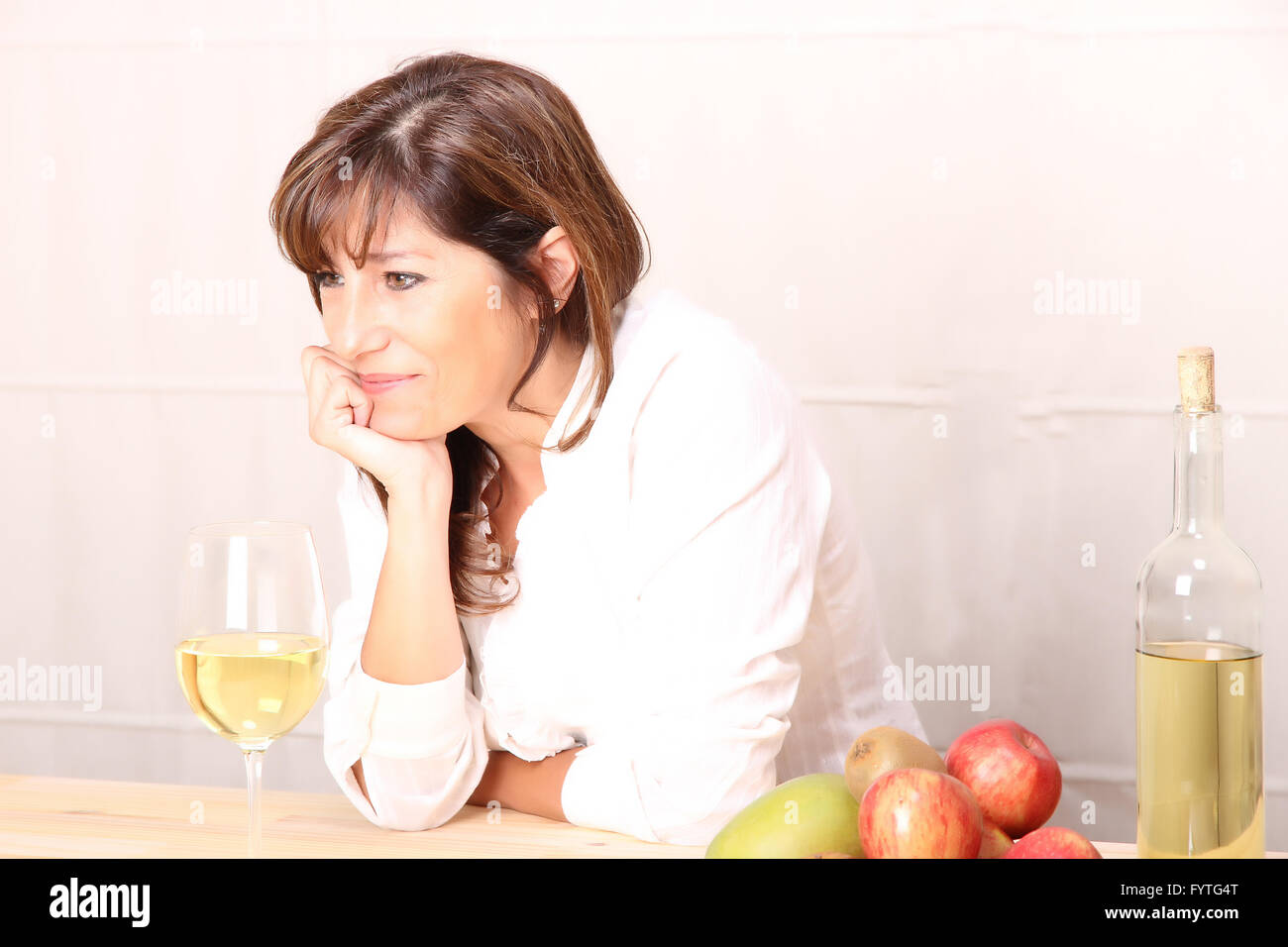 Woman with white wine Stock Photo - Alamy