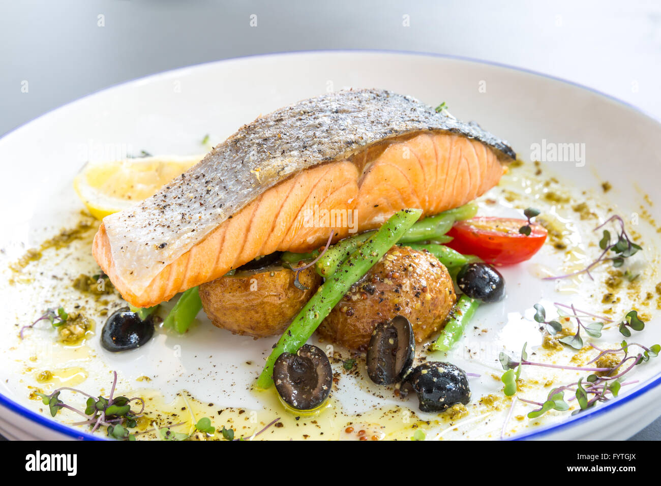 grilled salmon steak pesto Stock Photo Alamy