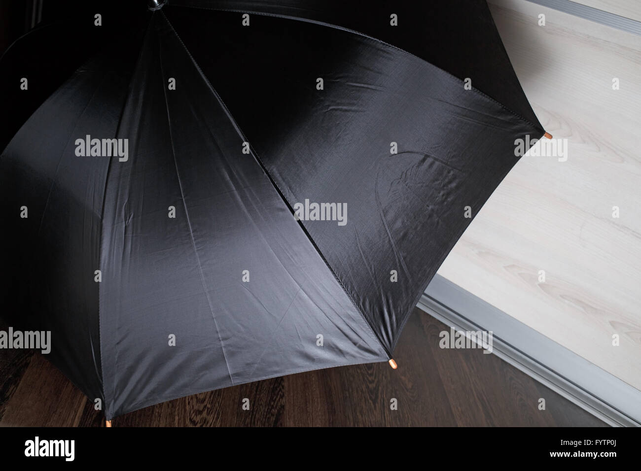 Large black umbrella hires stock photography and images Alamy