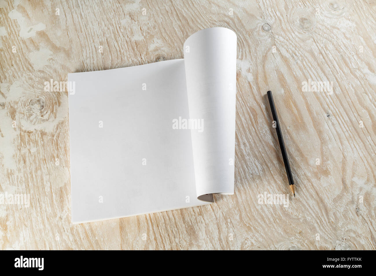 Brochure and pencil Stock Photo