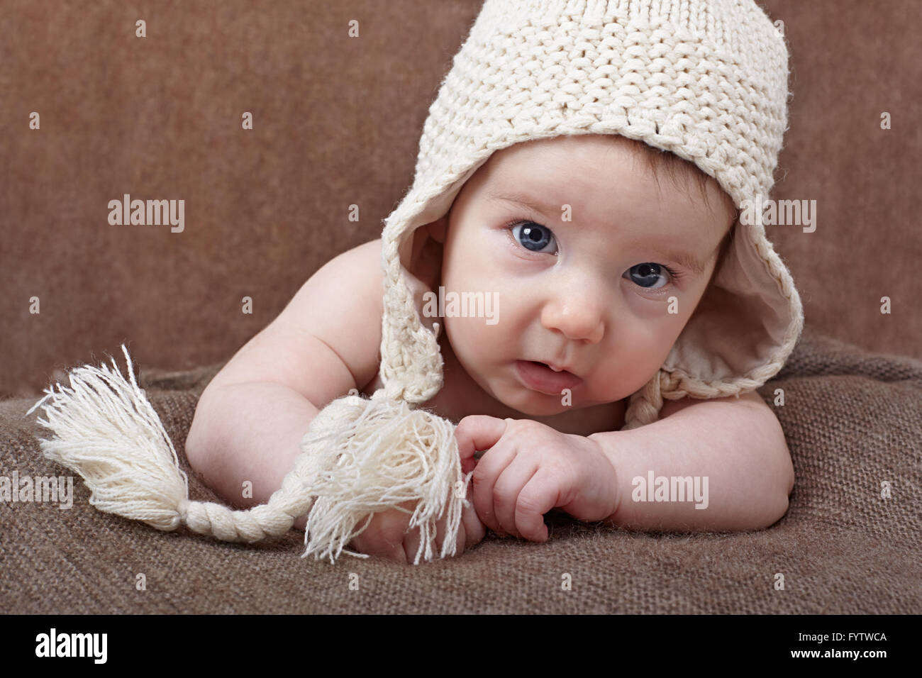 Portrait of a baby in a knitted cap Stock Photo