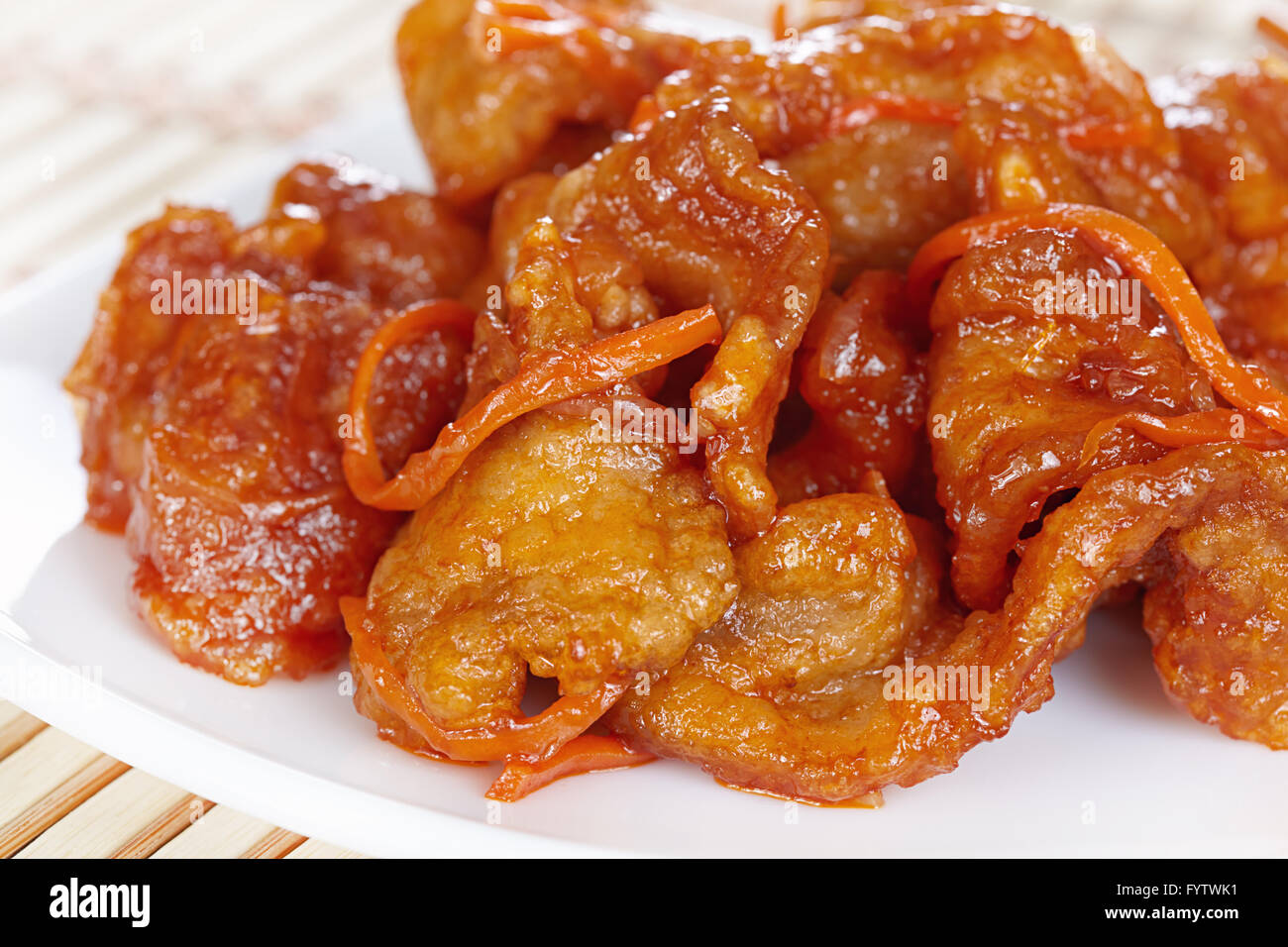 Chinese cuisine. Pork in batter and sweet and sour sauce Stock Photo