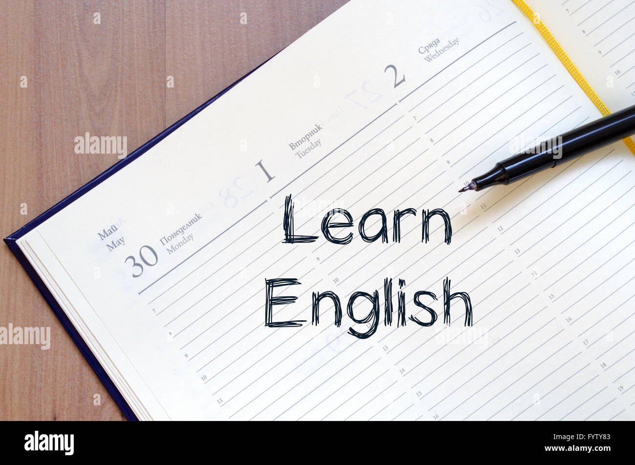 Learn english write on notebook Stock Photo Alamy