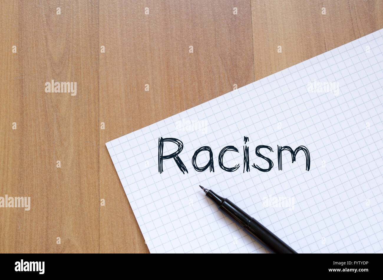 Racism write on notebook Stock Photo Alamy