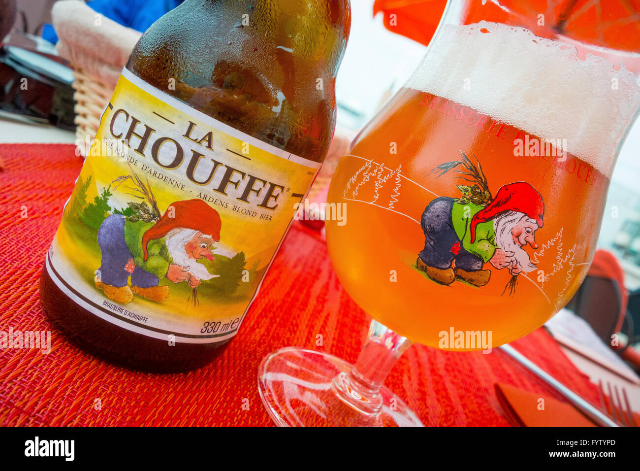 BELGIUM Bottle and glass of La Chouffe blond beer at cafe Stock Photo Alamy
