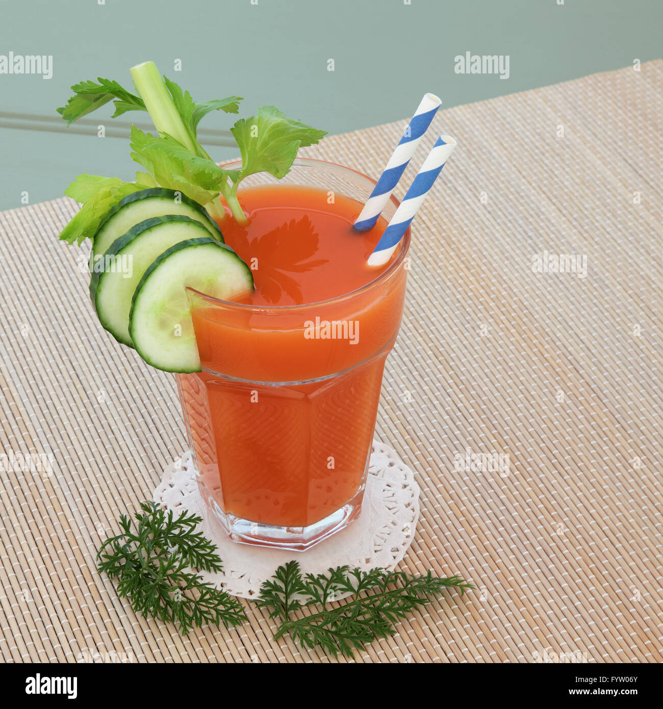Carrot juice vegetable health drink with celery and cucumber with