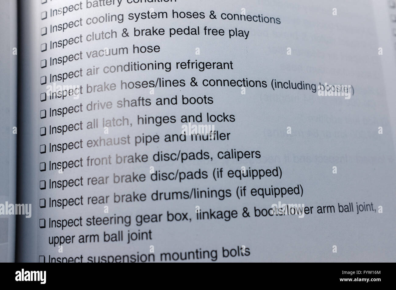 An inspection guide in a Hyundai Accent Owner's Manual. Stock Photo