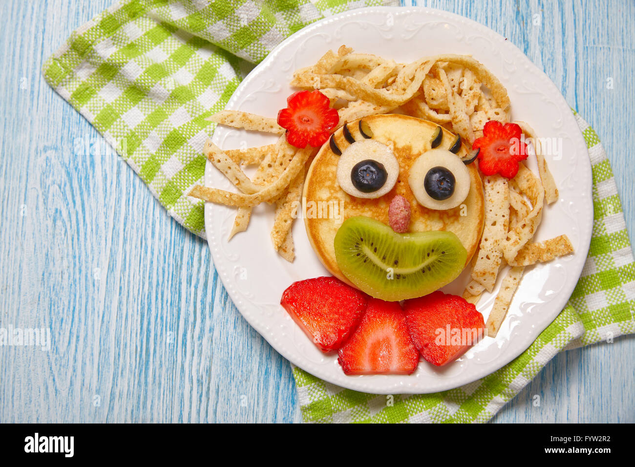Funny pancake face with fruits and berries Stock Photo Alamy