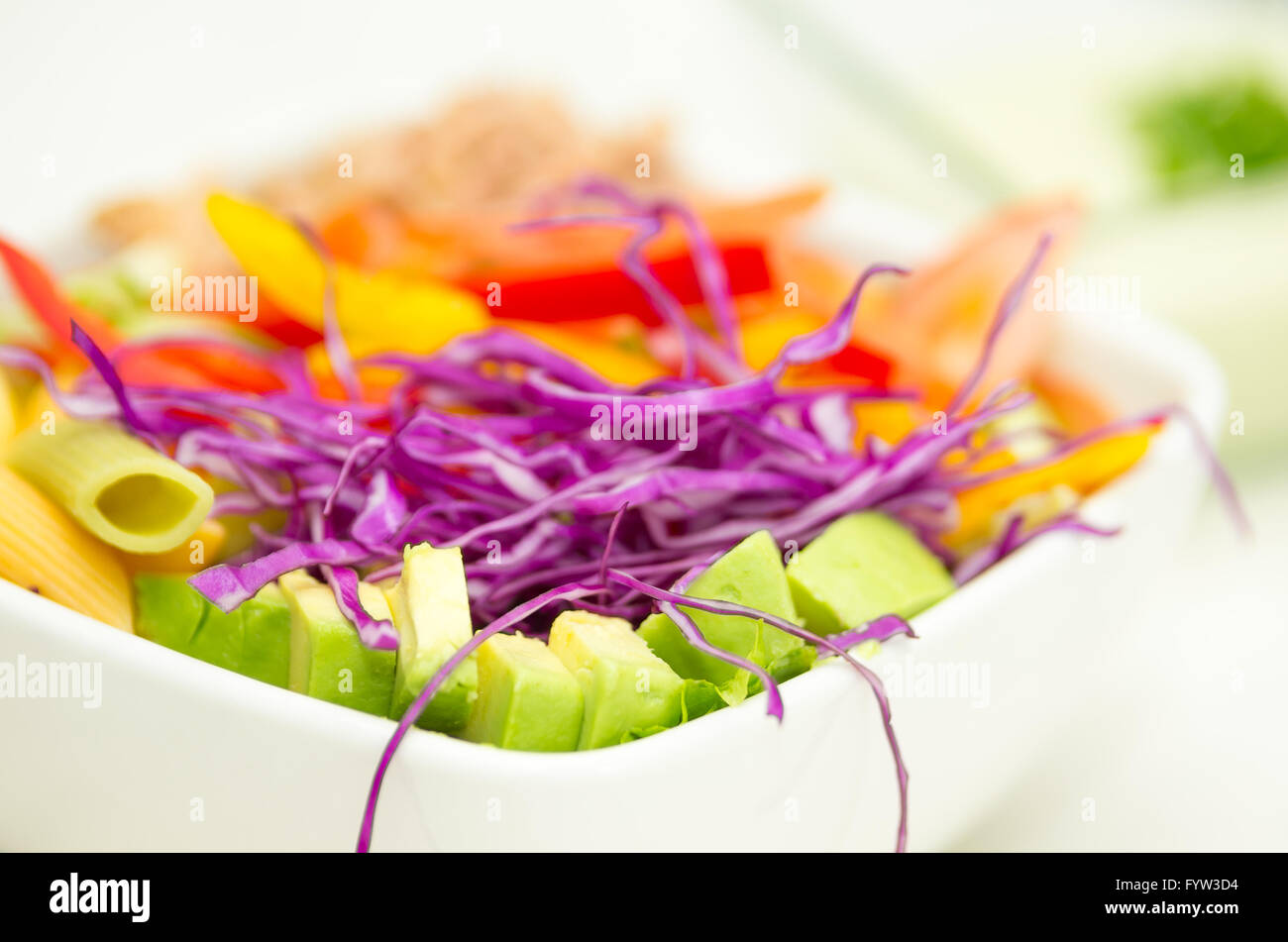 Closeup delicate fresh presentation of pasta salad in white bowl with ...