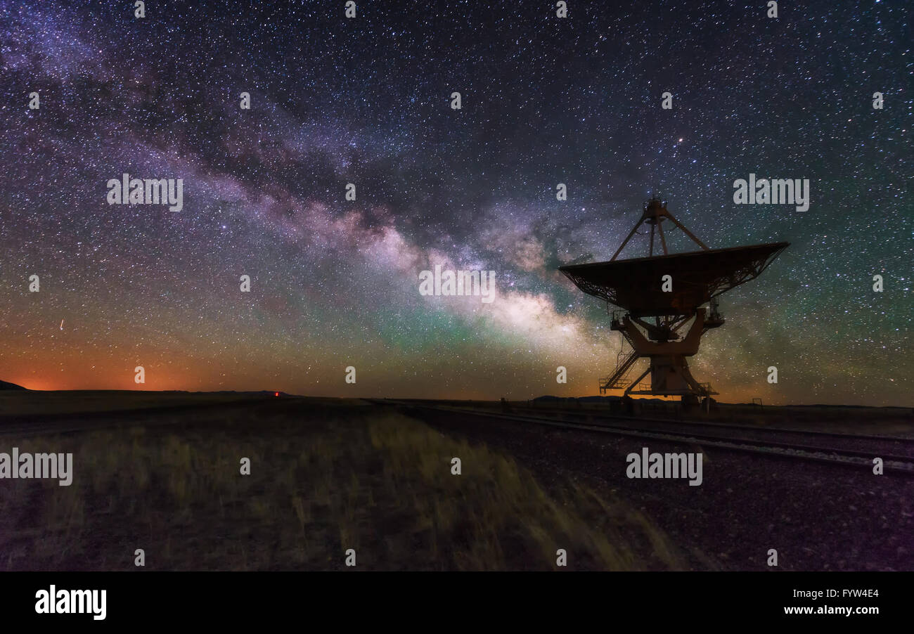 Milky way and big antenna dish at Very Large Array, New Mexico, USA. Powerful telescope for astronomy searching Stock Photo