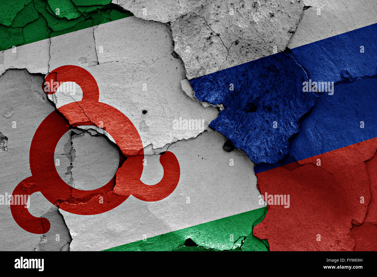 flags of Ingushetia and Russia painted on cracked wall Stock Photo