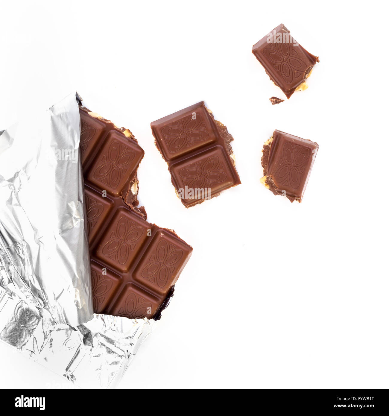 Bar milk chocolate hazelnuts pieces hi-res stock photography and images ...