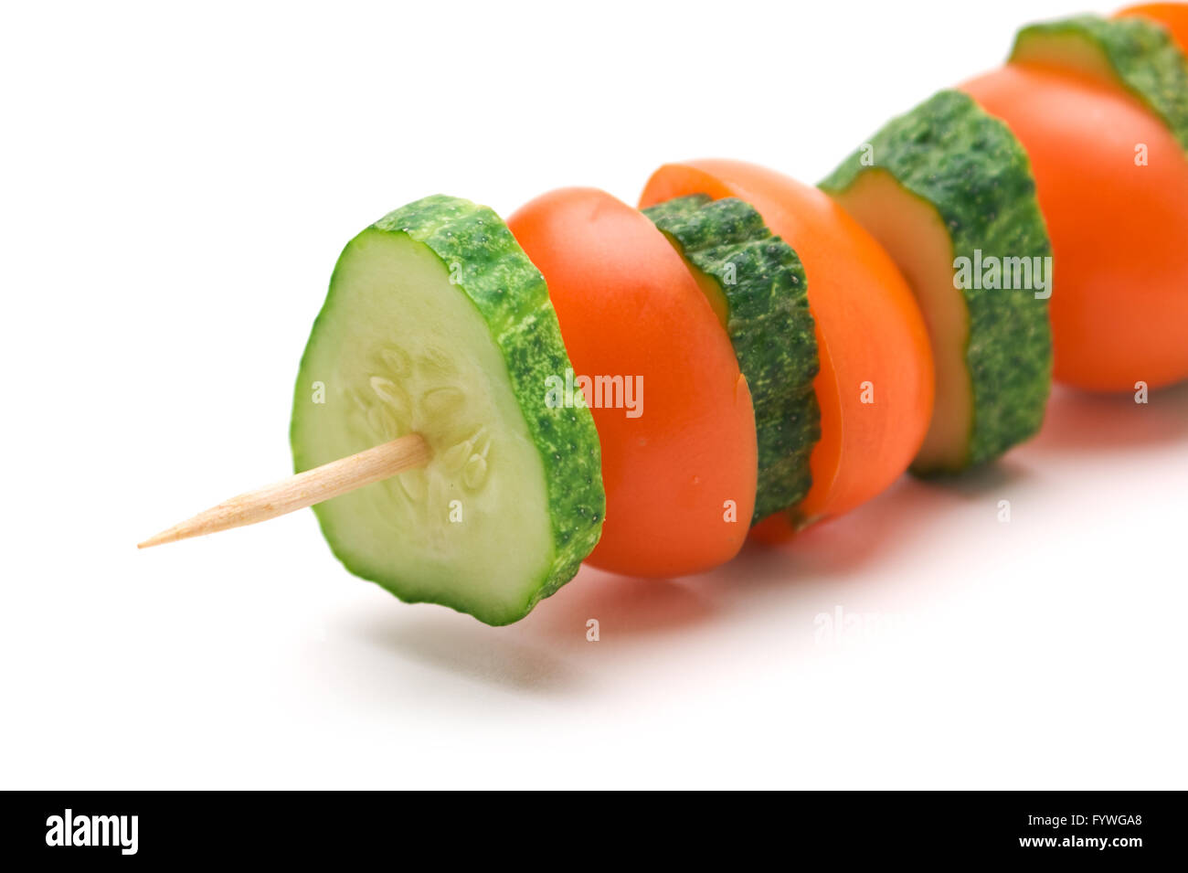 slices of cucumbers and tomatoes on a wooden stick Stock Photo - Alamy