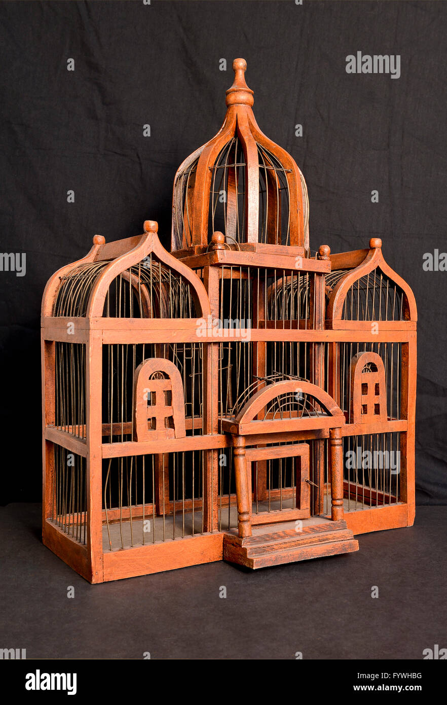 Vintage custom made wood and metal wire bird cage Stock Photo