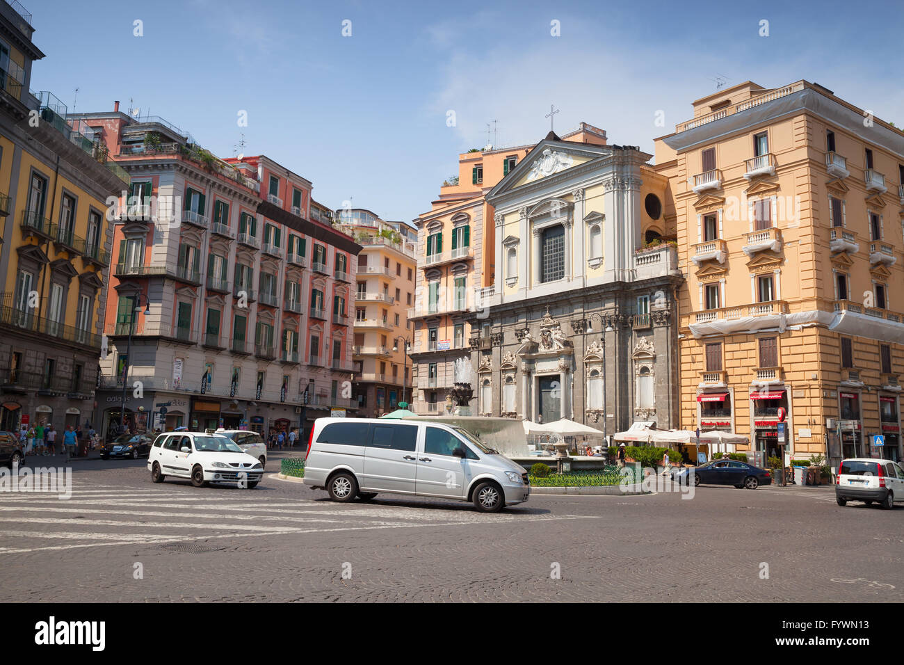 Naples, Italy - August 9, 2015: Street view of old Naples. Piazza Trieste E Trento, facade of Galleria Umberto Stock Photo
