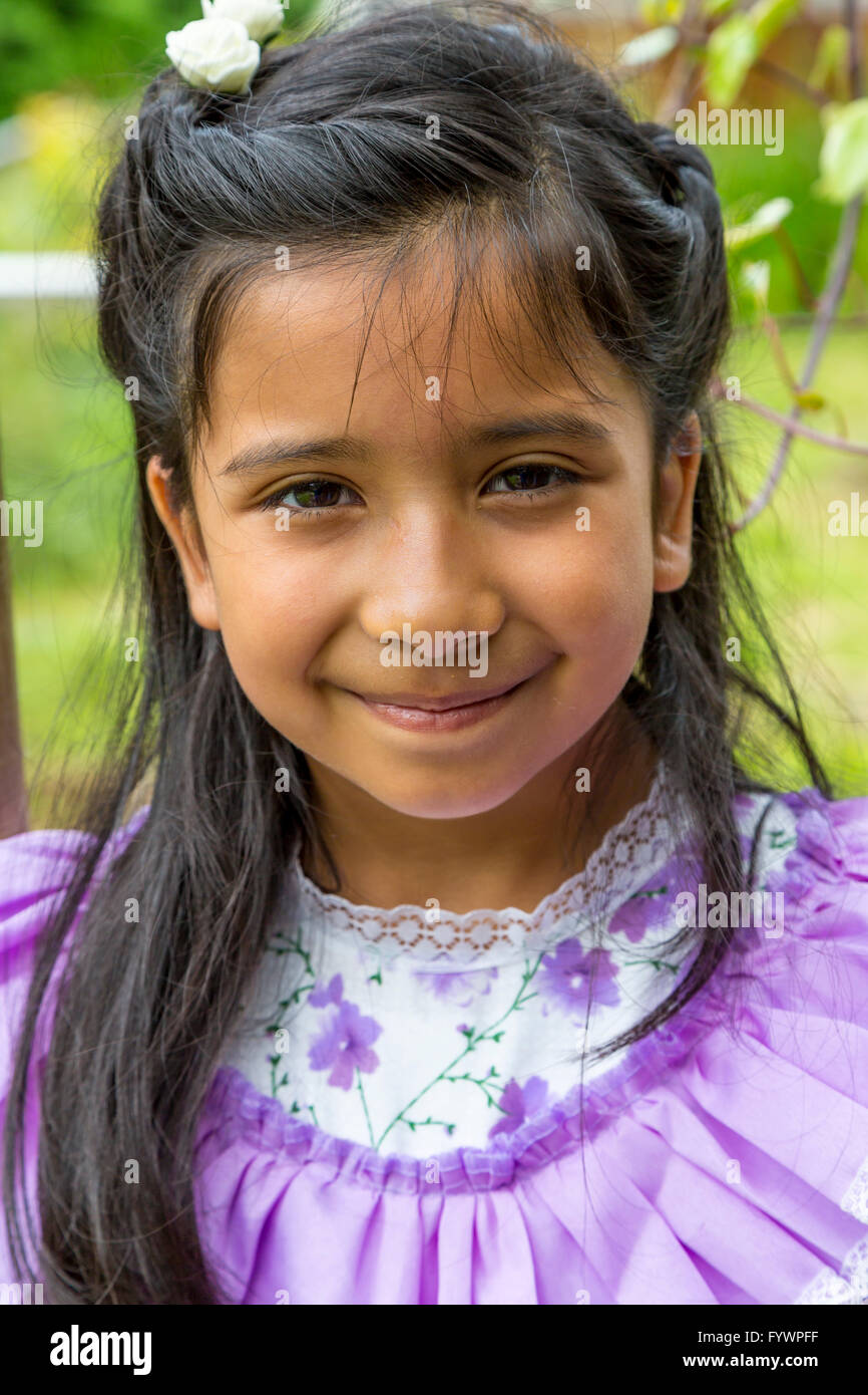 A young girl posing for a portrait at Hidden Valley, Chile, South America. Stock Photo