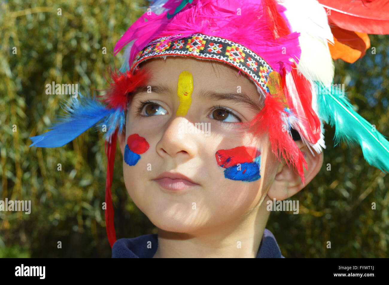 Cute kid dressed as Injun Stock Photo - Alamy