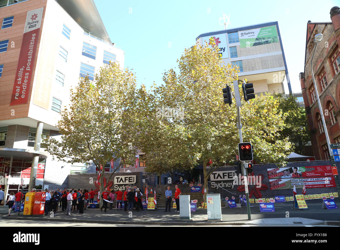 Sydney, Australia. 28 April 2016. Staff in TAFE colleges across the state who are members of the Public Service Association (PSA) are stopping work for three hours on the afternoon of Thursday 28 April to protest against proposed cuts to working conditions. Pictured is the main rally at Ultimo College of TAFE, Sydney (Harris Street entrance). Credit: Richard Milnes/Alamy Live News. Stock Photo