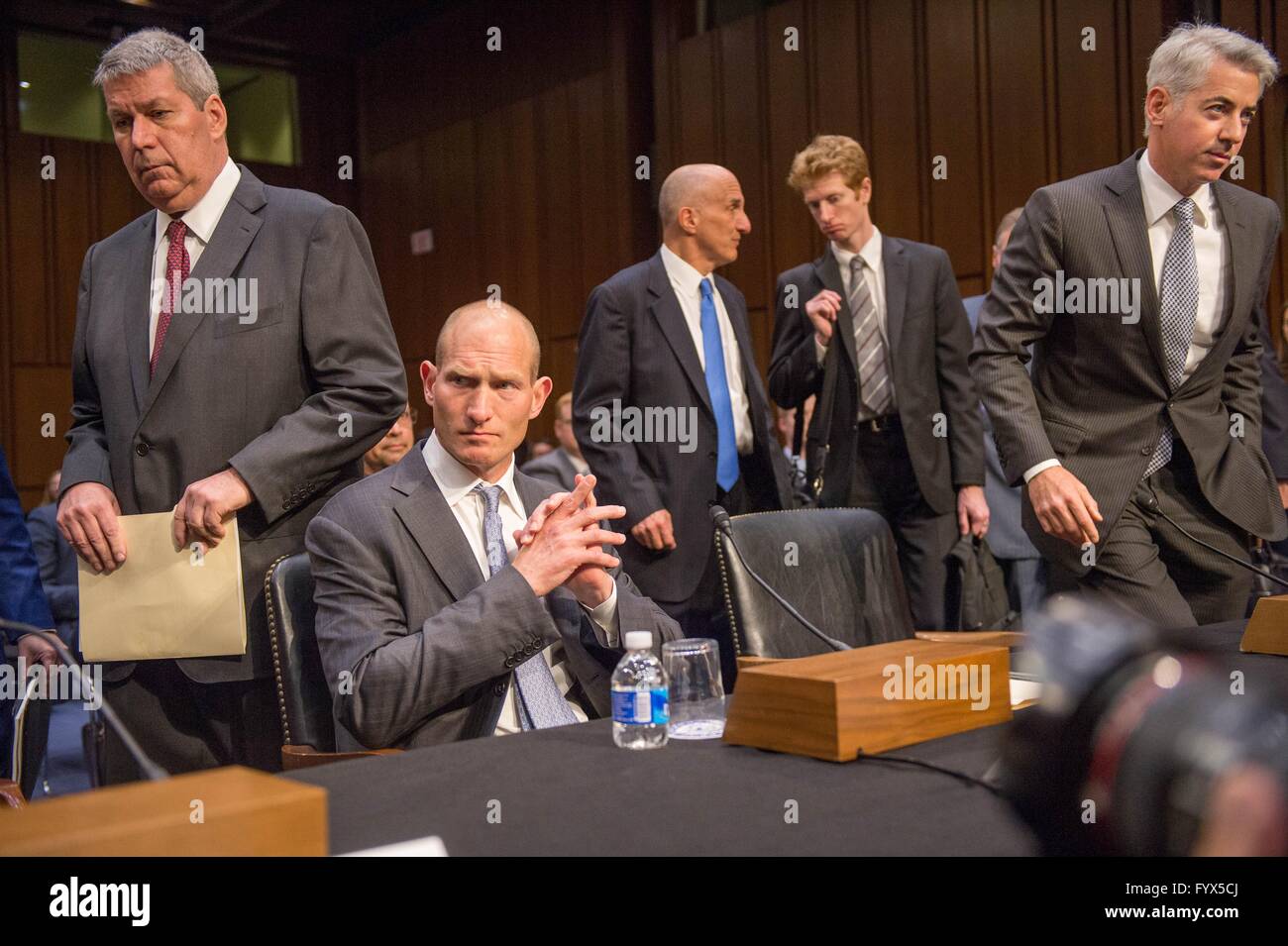 The Valeant Pharmaceuticals executive team arrive to testify at the U.S Senate Committee on Aging hearing on their business practices at Capitol Hill April 27, 2016 in Washington, DC. (L to R): Valeant CEO Michael Pearson, Former CFO Howard Schiller, and Pershing Square Capitol William Ackman. Stock Photo