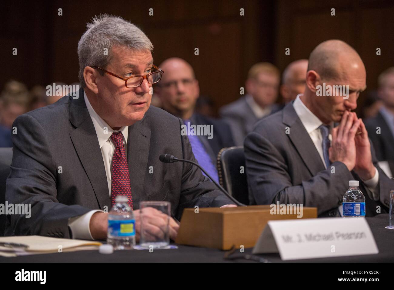 The Valeant Pharmaceuticals CEO Michael Pearson testifies before the U.S Senate Committee on Aging hearing about their business practices on Capitol Hill April 27, 2016 in Washington, DC. To the right of Pearson is Valeant Former CFO Howard Schiller. Stock Photo