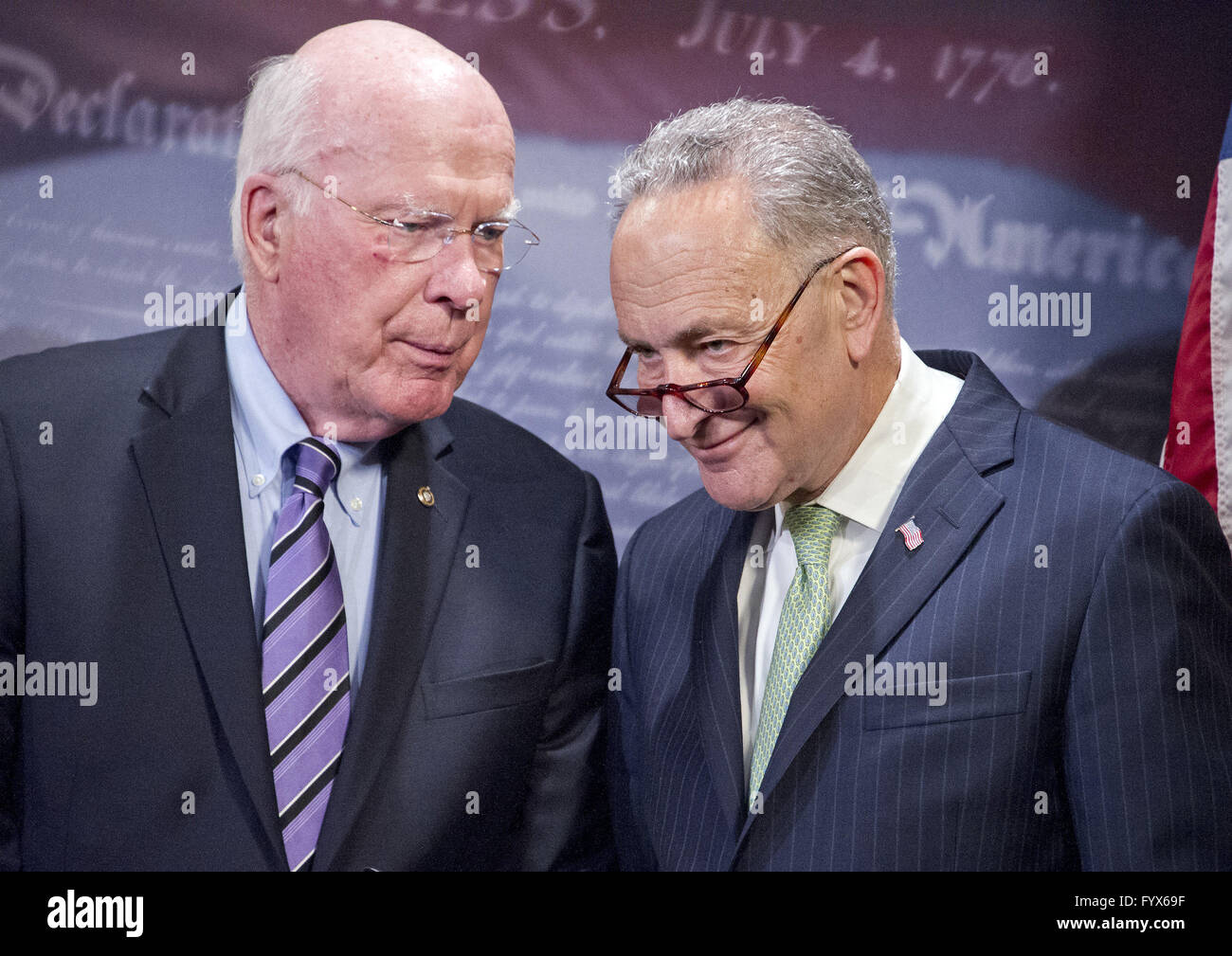 Washington, District of Columbia, USA. 28th Apr, 2016. United States Senators Patrick Leahy (Democrat of Vermont), left, and Chuck Schumer (Democrat of New York), right, speak to one another during a press conference calling on the US Senate Republican leadership to bring to the floor the bipartisan Sentencing Reform and Corrections Act, a bill to reduce some mandatory minimum sentences and apply those changes retroactively to inmates currently serving unfair sentences.Credit: Ron Sachs/CNP Credit:  Ron Sachs/CNP/ZUMA Wire/Alamy Live News Stock Photo