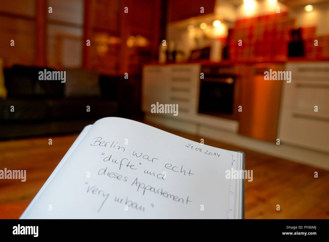 Berlin, Germany. 28th Apr, 2016. A guestbook of the holiday apartment 'Schmiede Harley' reads 'Berlin was really awesome and this apartment very urban' in Berlin, Germany, 28 April 2016. Photo: BRITTA PEDERSEN/dpa/Alamy Live News Stock Photo