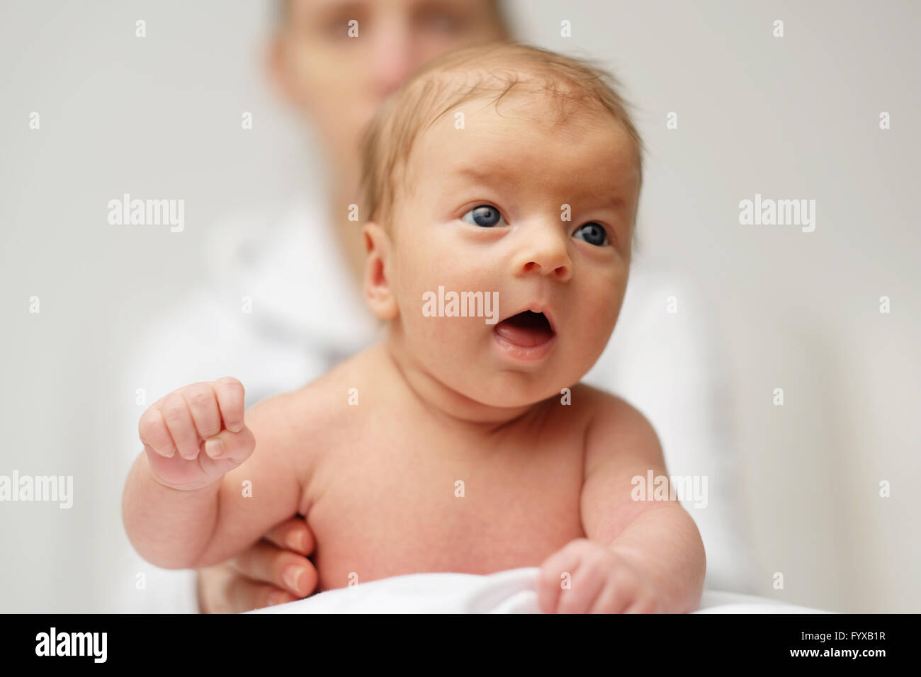 One month old newborn baby with mother Stock Photo Alamy