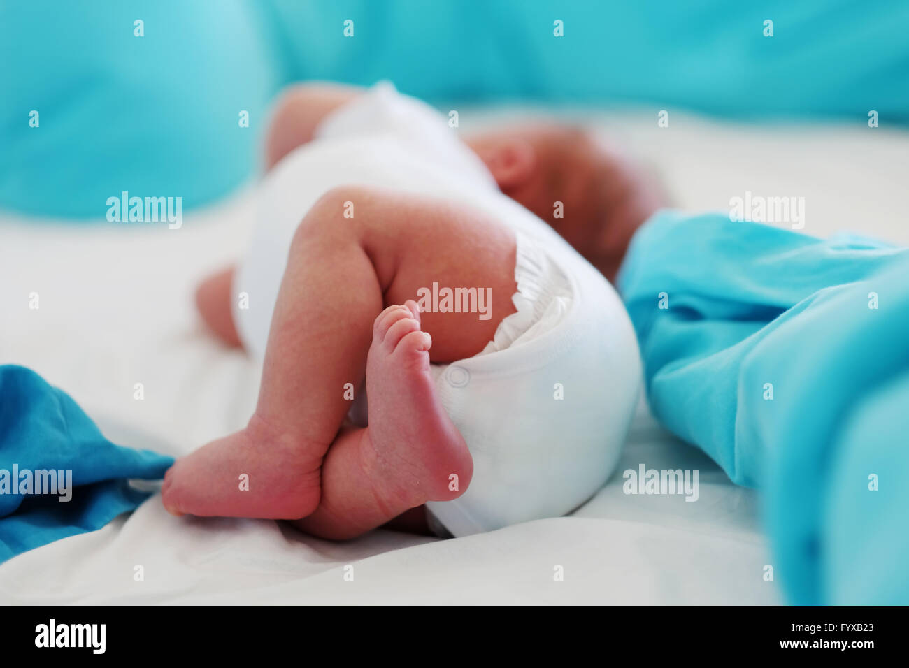 Two weeks old newborn baby's legs and bottom Stock Photo Alamy