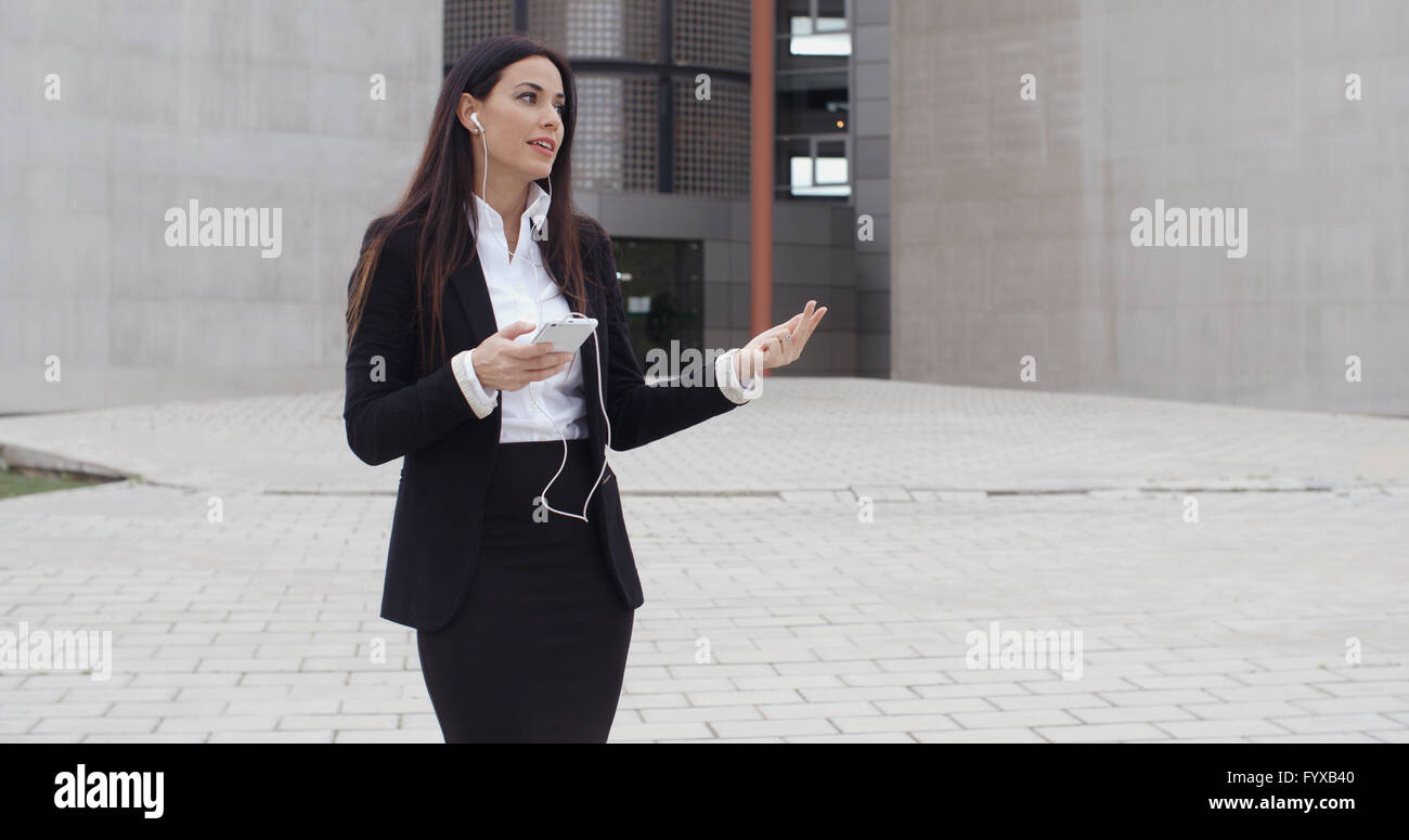 Young businesswoman talking on her mobile Stock Photo