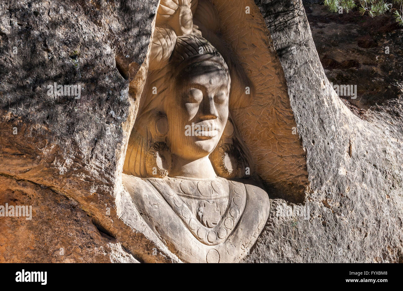 Sculptures carved on sandstones in the Ruta de las Caras, Route of the Faces Stock Photo