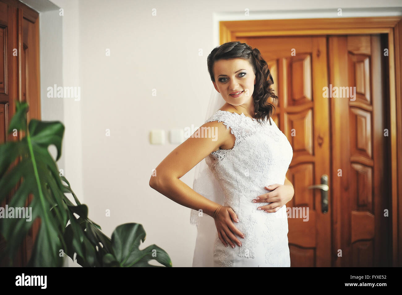 Bride posed at her morning wedding day Stock Photo