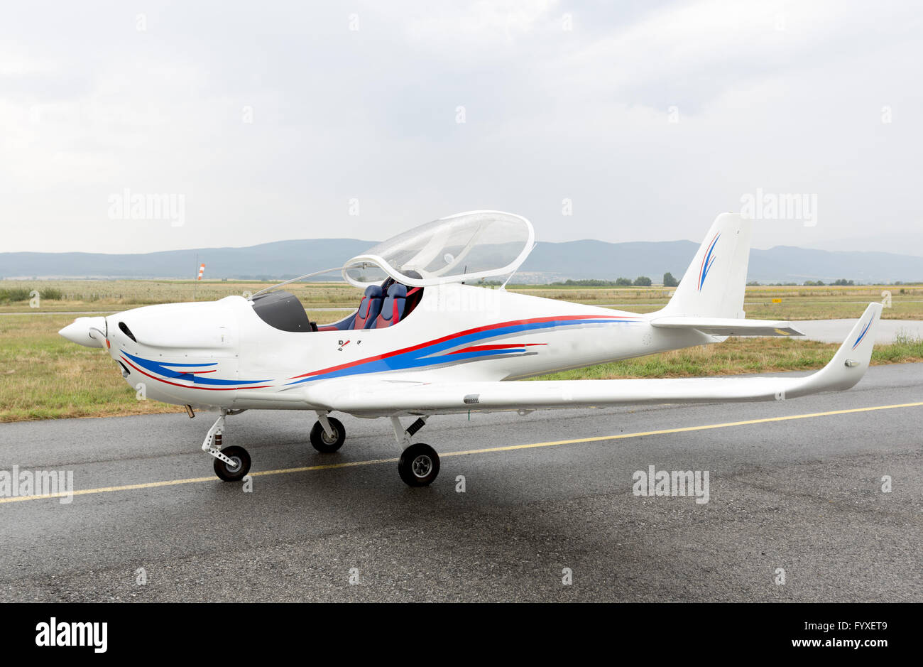 Small twoseated propeller airplane Stock Photo Alamy