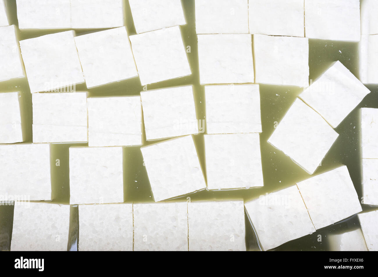Greek white feta cheese cubes Stock Photo - Alamy