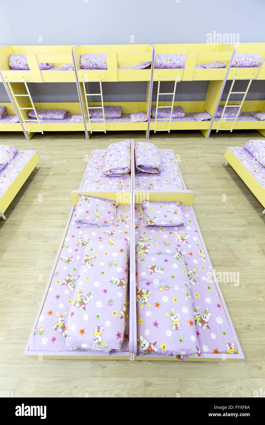 Modern kindergarten bedroom with small beds Stock Photo Alamy