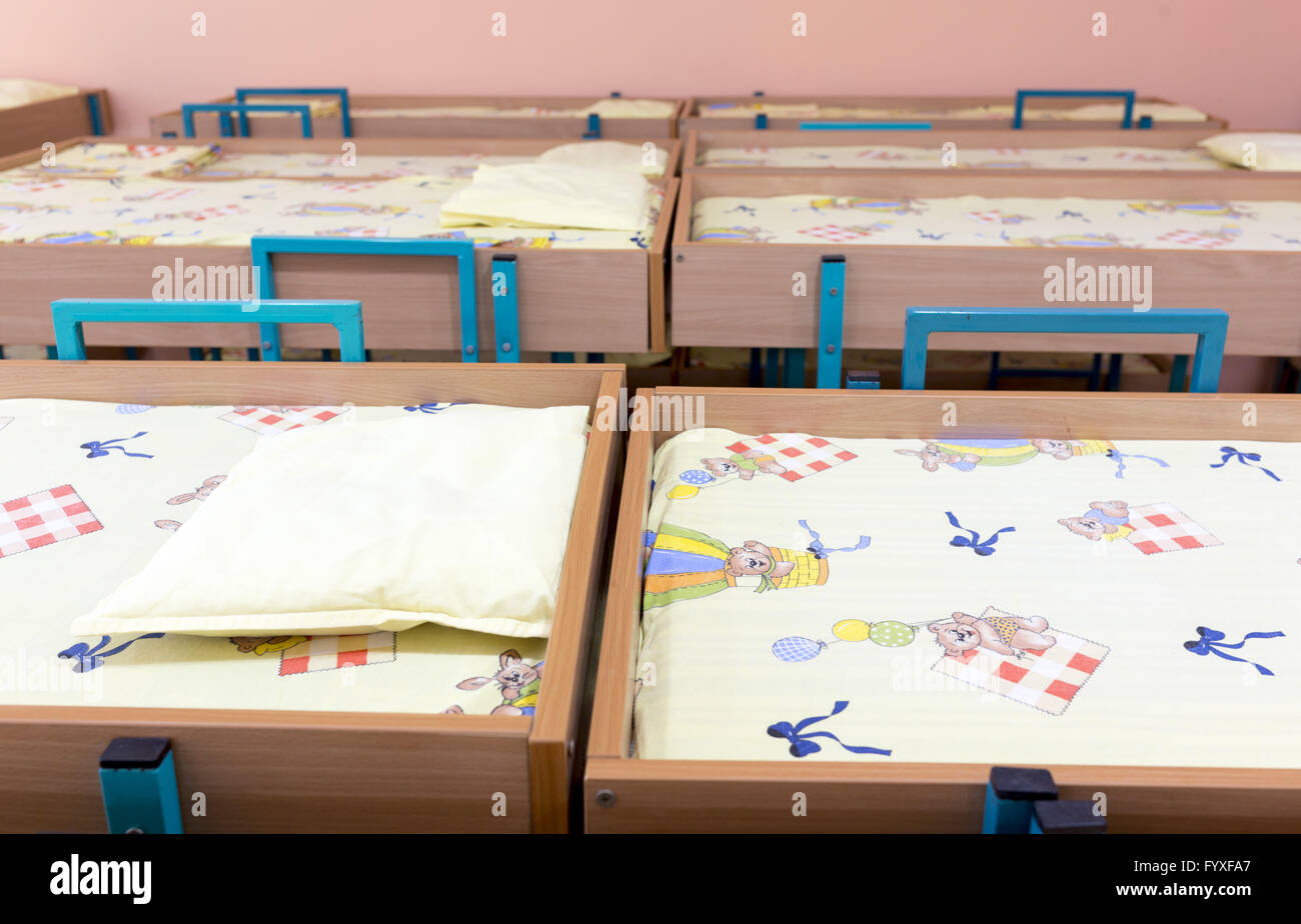 Kindergarten bedroom with small beds Stock Photo Alamy