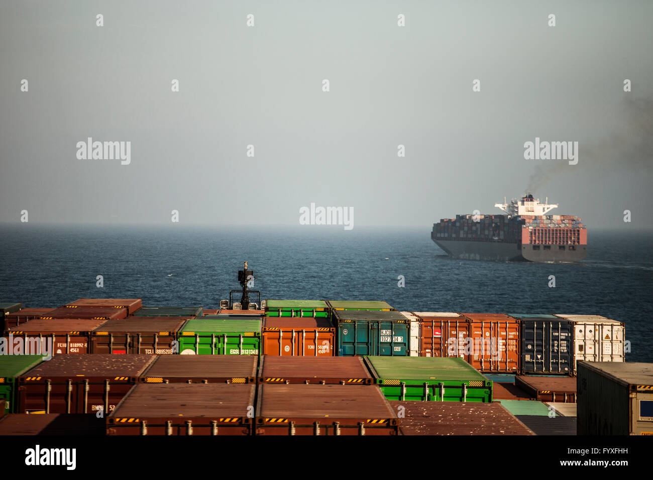 Container ship waiting to enter the Suez Canal just north of the Egyptian coastline. Stock Photo