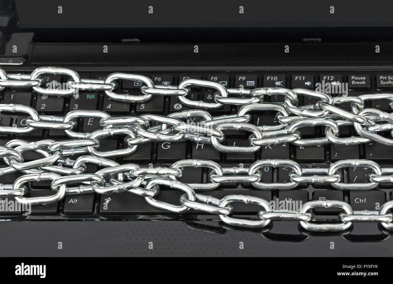 Notebook and chains Stock Photo - Alamy