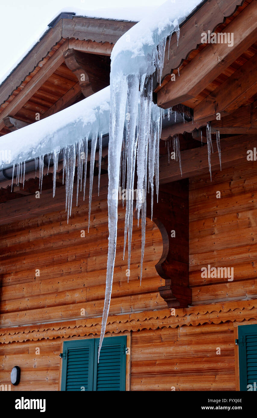 Icicles at chalet, Les Crosets, Switzerland / gutter Stock Photo
