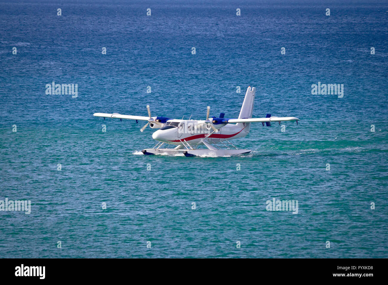 Floatplane mooring on open sea Stock Photo