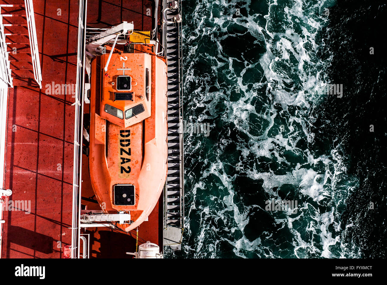 Life boat viewed from above on board a container ship in the Suez Canal. Stock Photo